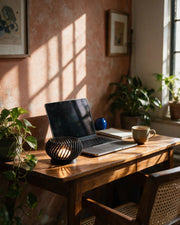 Spiral Tealight Holder – on a work desk in morning sun