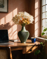Spiral Urn Vase – on a work desk in morning sun