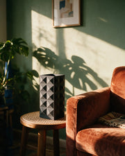 Stud Slab Vase – on a side table at golden hour