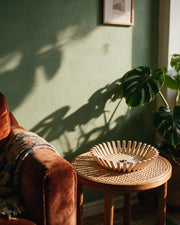 Sunburst Dish – on a side table at golden hour