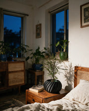 Swirl Rib Planter – at night on a bedside table