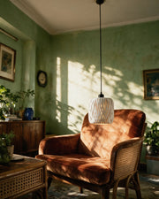 Teardrop Slot Pendant Light – on a side table at golden hour