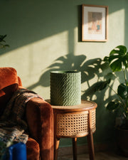 Twist Column Planter – on a side table at golden hour