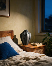Twist Flame Vase – at night on a bedside table