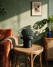 Twist Pedestal Display Stand – on a side table at golden hour