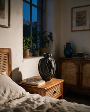 Twist Urn Vase – at night on a bedside table