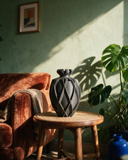 Twist Urn Vase – on a side table at golden hour
