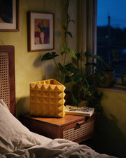 Triangle vase – at night on a bedside table