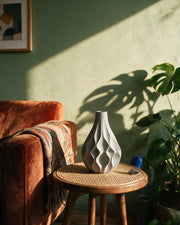 Wave Facet Vase – on a side table at golden hour