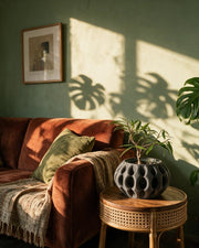 Wave Fin Planter – on a side table at golden hour
