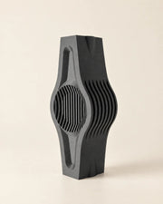 Wave Slab Fin Vase – three-quarter studio view