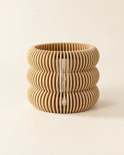Wavy Ring Orchid Planter – three-quarter studio view