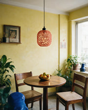 Web Capsule Pendant Light – styled on a console