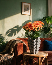 Wing Fold Vase – on a side table at golden hour