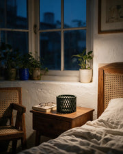 Woven Cage Planter – at night on a bedside table