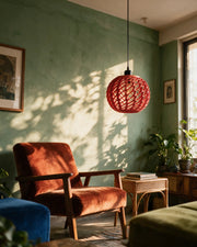 Woven Orb Pendant Light – on a side table at golden hour