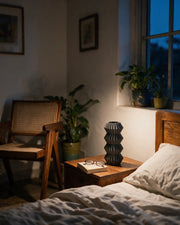 Zigzag Fold Vase – at night on a bedside table